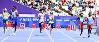 PARIS, 02 September 2024 – Paralympic sprinter Lahja Ishitile and her guide Sem Shimanda pictured during the women’s T11 100metre (m) race alongside Lorena Spoladore Silva of Brazil and her guide Renato Ben Hur Oliveira Costa (left) and Asila Mirzayorova and her guide Abduvokhidwon Mirzayorov of Uzbekistan (centre) during the Paris 2024 Paralympic Games. (Photo by: Hesron Kapanga) NAMPA