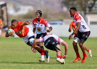 WINDHOEK, 15 September 2024  – Pioneers Park-based Wanderers Rugby Club players in white and and black while in action against UNAM in red and white during the final of the 2024 Namibia Rugby Union Premier League finals at the cathedral of Namibian Rugby the Hage Geingob Stadium in Windhoek. (Photo by: Hesron Kapanga) NAMPA