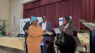 SWAKOPMUND, 19 September 2024 - Minister of Trade and Industrialisation (MIT) Lucia Iipumbu, Erongo Governor Neville Andre Itope and MIT Erongo Regional Coordinator Deputy Director Pinehas Shinyala witnessing the handover of ownership letters to beneficiaries of the Equipment Aid Scheme (EAS) and the Industrial Upgrading and Modernisation Programme (IUMP) grants in Erongo Region. (Photo by: Isabel Bento) NAMPA