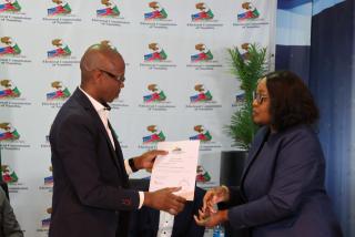 WINDHOEK, 17 October 2024 - Swapo Party legal adviser Sisa Namandje receiving Netumbo Nandi-Ndaitwah's nomination letter from ECN chairperson Elsie Nghikembua. (Photo by: Andreas Thomas) NAMPA

