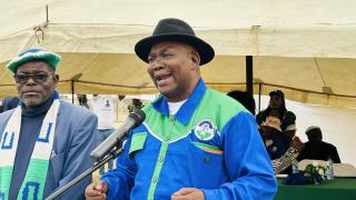 SWAKOPMUND, 26 October 2024 - United Democratic Front (UDF) President Hendrik Gaobaeb speaking at the part’s star rally at Swakopmund on Saturday. Beside him is Swakopmund Deputy Mayor David Am-!Gabeb. (Photo by: Isabel Bento) NAMPA