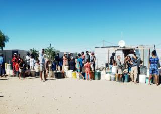 MARIENTAL, 29 October 2024 - Residents of the Takarania informal settlement queue for water as they await supply from the Mariental Municipality. (Photo by: Charmaine Boois) NAMPA 