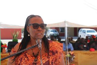 KATIMA MULILO, 30 October 2024 - The Minister of Education, Arts and Culture, Anna Nghipondoka delivers her keynote address at the official hand over of classrooms and hostel blocks at the Liselo and Masokotwani combined schools in the Zambezi Region on Tuesday. (Photo: Contributed)