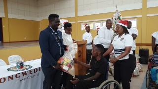 ONGWEDIVA, 19 November 2024 - Ongwediva Town Mayor Taarah Shalyefu handed over food parcels to people with disability during a Christmas lunch hosted on Tuesday at the town. (Photo by Maria David)NAMPA 