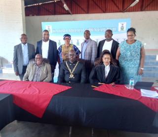 KATIMA MULILO, 03 December 2024 – John Ntemwa was re-elected as Katima Mulilo mayor on Tuesday. He is flanked here by Zambezi Governor Lawrence Sampofu as well as presiding officer, Magistrate Beatrice Sinyama Sibalatani. Standing are other elected councillors with Katima Mulilo Town Council Chief Executive Officer, Raphael Liswaniso and Katima Mulilo Urban Constituency Councillor, Kennedy Simasiku (second from left). (Photo by: Michael Mutonga Liswaniso) NAMPA   
