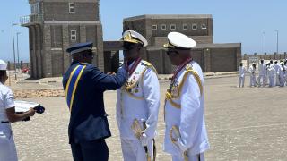 WALVIS BAY 23 December 2024 - Chief of the Namibian Defence Force Air Marshall Martin Pihehas frocking newly promoted and appointed Navy Commander Rear Admiral Sacheus Randy !Gonteb, while outgoing Navy Commander Rear Admiral (retired) Alweendo Paulus Amungulu watches on. (Photo by: Isabel Bento) NAMPA