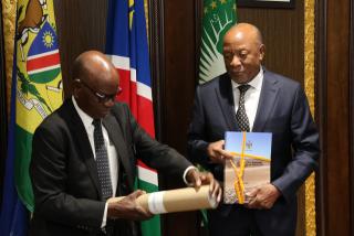 WINDHOEK, 21 January 2025 - President Nangolo Mbumba receiving the final report from the chairperson of the Boundaries Delimitation and Demarcation Commission, Petrus Unengu. (Photo by: Andreas Thomas) NAMPA
