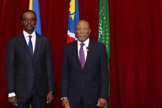 WINDHOEK, 31 January 2025 - High Commissioner of Rwanda to Namibia, Emmanuel Hategeka (L) pictured with President Nangolo Mbumba (R) (Photo by: Linea Dishena) NAMPA