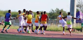 OSHAKATI, 01 January 2025 - UNAM FC football players celebrating their win against Blue Waters during the quarterfinals of the MTC Maris Cup at the Oshakati Independence Stadium. (Photo by: Hesron Kapanga) NAMPA