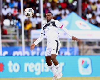 OSHAKATI, 02 January 2025 - Bucs Buccaneers' Kleopas Useb in action against KK Palace during the quarter-finals of the MTC Maris Cup at the Oshakati Independence Stadium. (Photo by: Hesron Kapanga) NAMPA