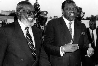 WINDHOEK, 12 July 1996 - Prime Minister Hage Geingob gestures as he talks to President Sam Nujoma at Eros Airport upon the President's return from his State visit to Spain, Cameroon and Gabon. (Photo by: Joseph Nekaya) NAMPA 