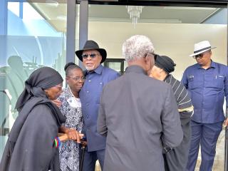 WINDHOEK, 09 February 2025 - President Nangolo Mbumba embraces family members of the late Founding Father, Sam Nujoma. (Photo by: Eba Kandovazu) NAMPA