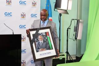 WINDHOEK, 13 February 2025 - MICT Executive Director Audrin Mathe unveiling the official mourning portrait of Founding President Sam Nujoma. (Photo by: Andreas Thomas) NAMPA
