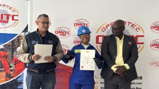 WALVIS BAY, 20 February 2025 - Walvis Bay Mayor Trevino Forbes (L) and OMITC Director Absalom Fillipus photographed with graduate Rosie Khaxas, one of the beneficiaries of the rigging training which they completed on Friday. (Photo by: Isabel Bento) NAMPA