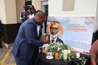 WALVIS BAY, 22 February 2025 - Namport Chief Executive Officer Andrew Kanime lighting a candle in honour of the later Founding President Dr Sam Nujoma. (Photo contributed) NAMPA