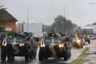 WINDHOEK, 20 March 2025 - A military street procession during rainy weather in Windhoek. (Photo by: Linea Dishena) NAMPA