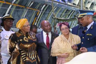 WINDHOEK, 07 MAY 2025 - President Netumbo Nandi-Ndaitwah (L), Prime Minister Elijah Ngurare (M), Vice President Lucia Witbooi (R) being briefed by Namibian Air Force Air Vice Marshal Teofilus Shaende (R) about the new NDF Y-9E aircraft at the Hosea Kutako International Airport. (Photo by: Linea Dishena) NAMPA