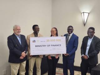 WINDHOEK, 12 May 2025 - Evans Simataa, chairperson of the Board of Directors of Windhoek Country Club Resort (WCCR) handed over a dividend to the amount of N.dollars 25 million to Tjiuee Kaura, Director: Governance and Financial Advice in the Ministry of Finance and Public Enterprises, on Friday. 
(Photo: contributed) NAMPA 
