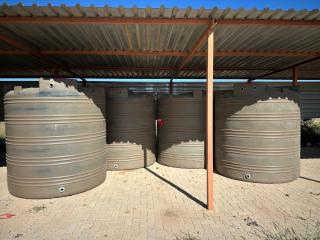 OUTJO, 13 May 2025- The Outjo Constituency office handed over four water tanks and pipes to local farming communities in the Outjo Constituency. (Photo: Contributed) NAMPA
