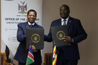 WINDHOEK, 03 June 2025 - Chief Justice Peter Shivute and Ugandan Chief Justice Alfonse Chigamoy Owiny-Dollo during the signing of MoU (Photo: Andreas Thomas) NAMPA
