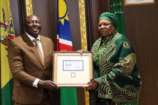 WINDHOEK, 12 JUNE 2025- Namibia Post Limited Board Chairperson Simeon Amunkete (L) presents commemorative stamp to President Netumbo Nandi-Ndaitwah as a fifth President. (Photo by: Linea Dishena) NAMPA 