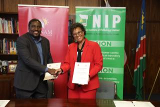 WINDHOEK, 17 JUN – UNAM Vice Chancellor Kenneth Matengu (left) and NIP CEO Kapena Tjombonde (right) at the MoU signing ceremony. (Photo: Contributed) NAMPA 