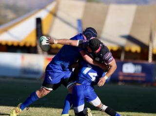 WINDHOEK, 21 June 2025 - Welwitschias players (in blue) and an Airlink Pumas player while in action during a friendly match which the Pumas won 59-19 at Hage Geingob Stadium in Olympia, Windhoek. (Photo by: Hesron Kapanga) NAMPA 
