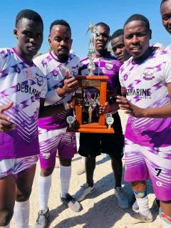 ONGWEDIVA, 13 JULY - Players from the Otjiwarongo-based team Life Fighters celebrate with a trophy after their victory in the North West First Division, which marked their return to the Namibian Premier Football League. (Photo: Contributed) NAMPA.