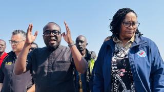 WALVIS BAY, 01 August 2025 - Erongo Governor Natalia /Goagoses and Walvis Bay Rural Constituency Councillor Florian Donatus  addressing some of the disgruntled residents of Walvis Bay who were recently evicted from a private plot. The about 50 residents were reportedly removed by a messenger of the court through a court order. (Photo by: Isabel Bento) NAMPA