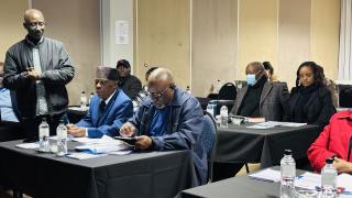 SWAKOPMUND, 11 August 2025 - Member of Parliament (MP) and Chairperson of the Parliamentary Standing Committee of Constitutional and Legal Affairs Modestus Amutse, seated besides MP Martin Lukato at the opening of the capacity-building training in Swakopmund to strengthen committee’s ability to review, analyse, and engage with international treaties, conventions, and protocols. (Photo by: Isabel Bento) NAMPA