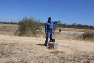 KONGOLA, 24 August 2025 - Retired Navy Captain of the Namibian Defence Force (NDF), Richard Kopano points out at the core area where several wars of the liberation struggle of the Namibian independence where fought in 1968 at Kamenga battlefield situated about 130 kilometres west of Katima Mulilo in the Zambezi Region. Kopano said Kamenga battlefield is where wars of the liberation struggle had shifted shortly after the first bullet of the struggle was fired at the Omugulugwombashe in the Omusati Region. (Photo by: Mulisa Simiyasa) NAMPA   