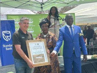 KATIMA MULILO, 18 September 2025 - Zambezi Regional Governor, Dorothy Kabula and Chief Agricultural Scientist Officer, Rodrick Maswabi presents the Master Crop Value Chain Actor Award 2025 to Danie Roux at the National Agronomy and Horticulture Awards held at the Zambezi Waterfront and Tourism Park at Katima Mulilo on Thursday. 

(Photo: Michael Mutonga Liswaniso) NAMPA