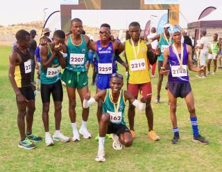KARIBIB, 20 Sepetember 2025 - Long-distance runners representing the Namibian Police Force (NamPol) and Namibia Correctional Service, posing for a photo at the end of the 11th edition of the QKR Namibia Navachab half-marathon in Karibib. (Photo by: Hesron Kapanga) NAMPA
