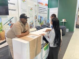 WINDHOEK, 02 October 2025 - Some youth engaging with an exhibitor at the Windhoek Showgrounds. (Photo: Edward Tenete) NAMPA