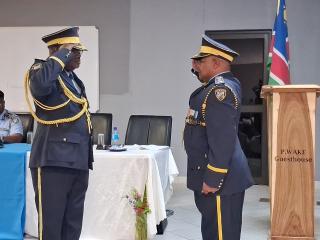 OPUWO, 02 October 2025 - Commissioner James Nderura (left) officially transferred power to newly appointed Kunene regional Police Commander Commissioner Eric Petrus Clay (right) on Wednesday in Opuwo. (Photo by: Uakutura Kambaekua) NAMPA.