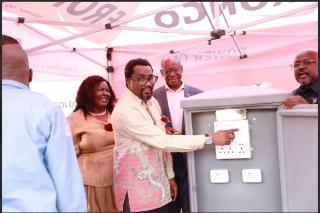 KARIBIB, 16 October 2025 - Deputy Prime Minister and Minister of Industries, Mines and Energy Natangwe Ithete switching on the playground for the newly electrics 257 houses in the Usab informal settlement at Karibib. He is photographed with Karibib Constituency Councillor Melania Ndjago, Navachab Mine CEO George Botshiwe and Erongo Red CEO Immanuel !Hanabeb. (Photo contributed) NAMPA
