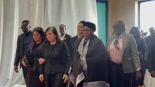 WALVIS BAY, 07 October 2025 - President Netumbo Nandi-Ndaitwah accompanying the wife of late Walvis Bay businessman John Savva, Roulla Savva and their daughters as they arrive  to her late husband during a memorial service. (Photo by: Isabel Bento) NAMPA