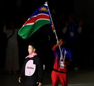 TOKYO, 15 November 2025 - Namibia's flag bearer parading the national flag during the opening ceremony of the 25th edition of the Deaflympics Summer Games at the Tokyo Metropolitan Gymnasium in Tokyo, Japan these years games also celebrated its 100th anniversary. (Photo by: Hesron Kapanga) NAMPA