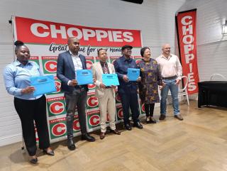 WINDHOEK, 18 NOVEMBER 2025 - (L-R) Wilka Leonard Choppies Namibia HR Manager, Molatedi Kgotla: Choppies Group HR Manager, Rector of Truimphant College Geoffrey Kiangi, IUM vice Chancellor Osmund Mandebele and stakeholders at the Choppies Graduate program and MOU signing. (Photo by: Negumbo Ali) NAMPA