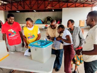 KATIMA MULILO, 24 November 2025 - Katima Mulilo Urban Constituency Presiding Officer, Lilian Kachana (second from left), and other polling officials with political party agents affixing seals to the ballot boxes before the start of the 2025 Regional Councils and Local Authorities Elections at the Ngweze community hall on Monday.

(Photo: Michael Mutonga Liswaniso) NAMPA