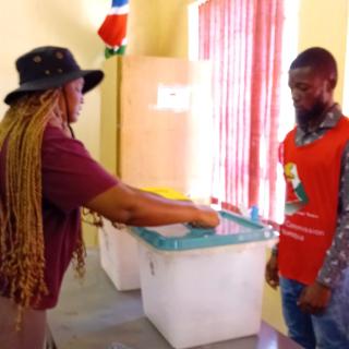 OPUWO, 24 November 2025 - Polling officer Celeste Jeremia casts her vote at the Opuwo Police Station during the Regional Councils and Local Authorities special elections. (Photo: Kaviveterue Virere) NAMPA