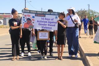 Keetmanshoop, 25 November 2025 - The community members marching from the J. STEPHANUS STADIUM, in support of the official launch for the  16 DAYS OF ACTIVISM
AGAINST GENDER BASED VIOLENCE CAMPAIGN (Photo by: Ministry of Gender(MGECW)) NAMPA