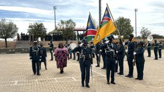 OMARURU, 11 December 2025 - Minister of Home Affairs, Immigration, Safety and Security Lucia Iipumbu  and NCS Commissioner General Raphael Hamunyela Hamunyela inspecting the parade of the 153 graduates from the Namibian Correctional Service’s ninth Basic Orientation training course at the Lucius Mahoto Correctional Service Training College on Thursday. (Photo by: Isabel Bento) NAMPA 