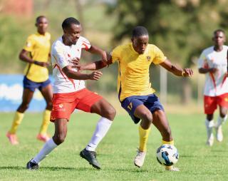 WINDHOEK, 31 January 2026 - Otjiwarongo-based Namibia Premier Football League (NPFL) outfit Mighty Gunners’ attacking midfielder Sedni Tsuseb (in gold) in action against UNAM FC during round 14 of the 2025/26 season at the UNAM Stadium. Mighty Gunners handed UNAM their first defeat after going unbeaten in 13 league matches. (Photo by: Hesron Kapanga) NAMPA