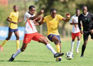 WINDHOEK, 31 January 2026 - Otjiwarongo-based Namibia Premier Football League (NPFL) outfit Mighty Gunners’ attacking midfielder Sedni Tsuseb (in gold) keeps his eye on the ball against UNAM FC during round 14 of the 2025/26 season at the UNAM Stadium. Mighty Gunners handed UNAM their first defeat after going unbeaten in 13 league matches. (Photo by: Hesron Kapanga) NAMPA