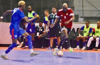 SWAKOPMUND, 04 February 2026 - ‘Brave Fives’ player Immanuel Angula (in blue) and Said Mohamed of Libya in action during the 2026 Morocco CAF Futsal AFCON qualifiers at The Dome in Swakopmund. Namibia lost the match 3-11 in the first leg of their round two CAF qualifiers. (Photo by: Hesron Kapanga) NAMPA 
