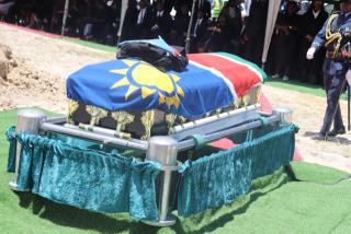 ONAMBANGO,14 February 2026 - The casket containing the remains of the late Ondangwa control prosecutor Justine Shiweda ready to be lowered on Saturday at the family's cemetery in Onambango village in Oshana region. (photo by: Ester Hakaala) NAMPA