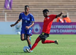 WINDHHOEK, 20 February 2026 - Muhinatjo Kamutuaa Hanavi of Namibia (in blue) while in action against Marlene Janeiro of Mozambique during the 2025 Hollywoodbets COSAFA Womens Championship match between Mozambique and Namibia at the Old Peter Mokaba Stadium, Polokwane. (Photo Contributed) NAMPA