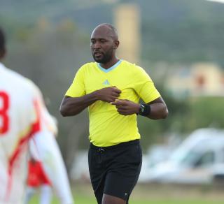 WINDHOEK, 14 March 2026 - Match official, Ericki Matheus, while officiating the match between UNAM FC and KK Palace at the UNAM Stadium during round 25 of the Namibia Premier Football League. The match ended 2-1 in favour of UNAM. (Photo by: Hesron Kapanga) NAMPA