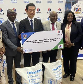 WINDHOEK, 16 March 2025 - The Prime Minister, Elijah Ngurare (middle), the Ambassador of South Korea to Namibia, Kwang-Jin Choi (middle), WFP Regional Director for the Eastern and Southern Africa Region, Eric Perdison and Secretary to Cabinet, Emilia Mkusa (Far right) pictured at the donation of rice from South Korea.